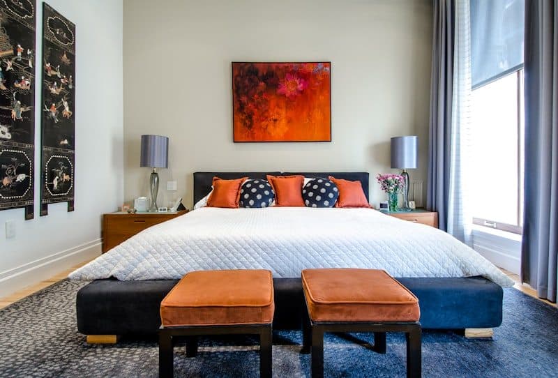 Bedroom with arranged linens